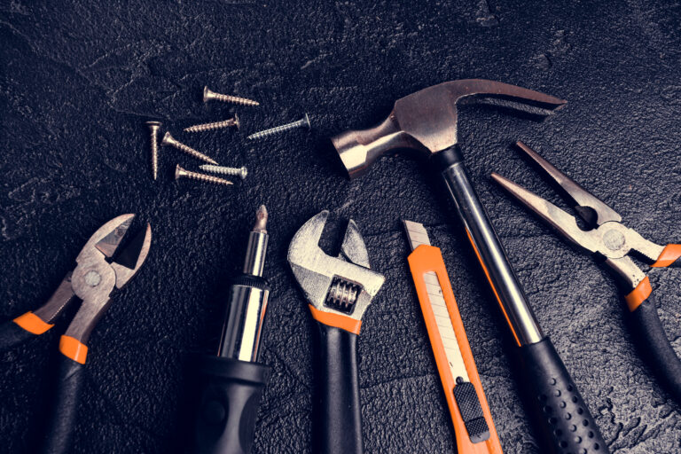 Basic Home Repair Tools On Black Background