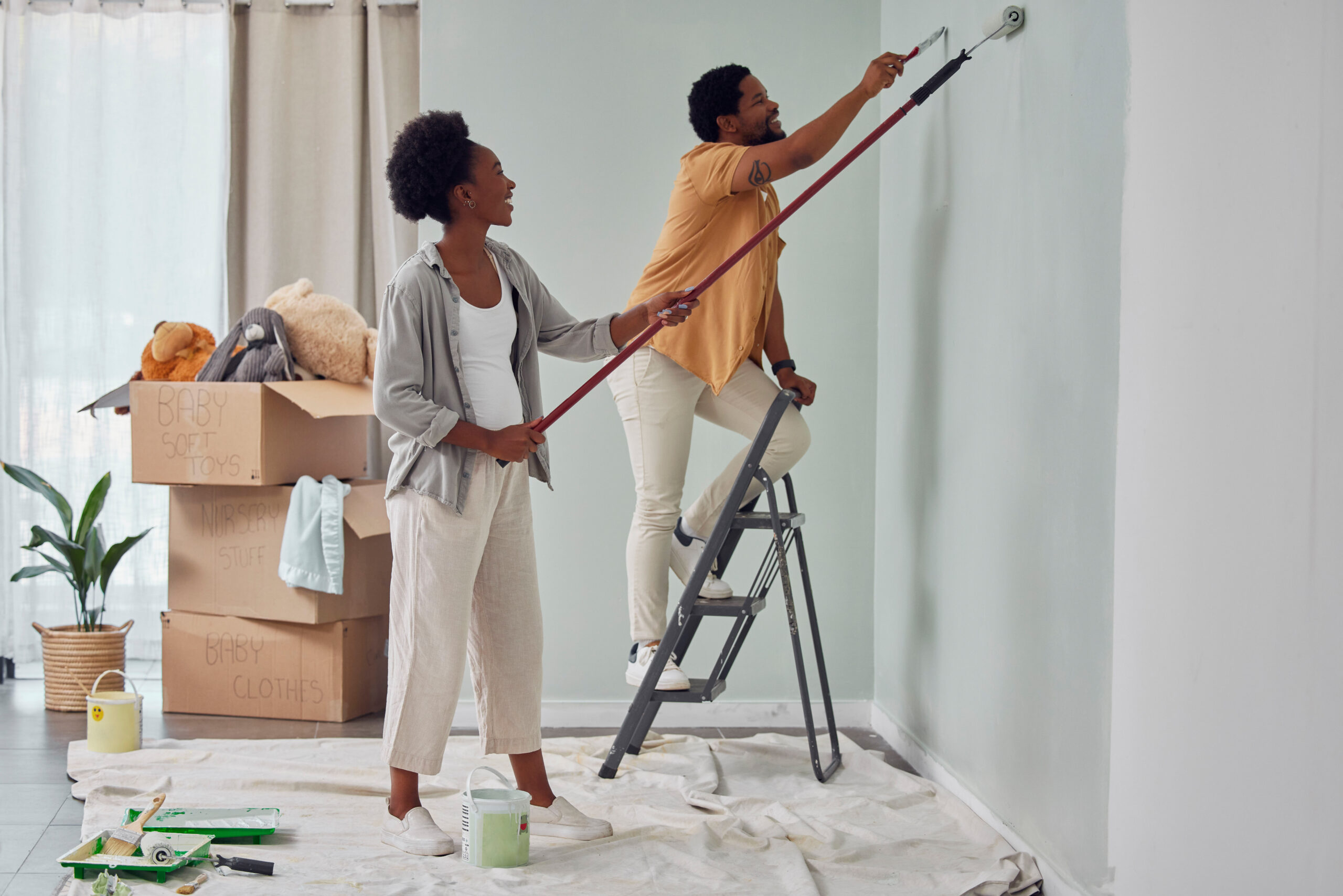 painting-teamwork-or-black-couple-home-renovation-2023-11-27-04-54-36-utc